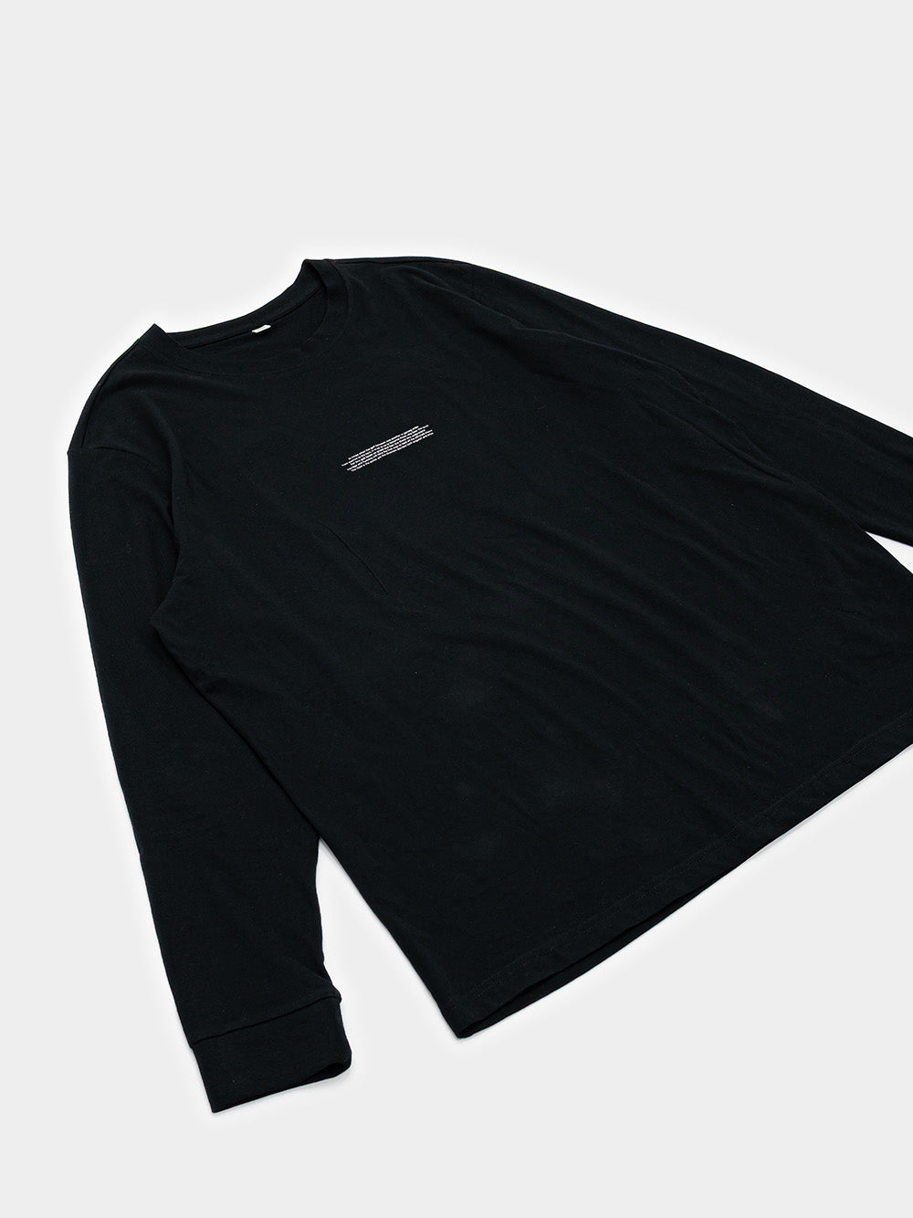 Schwarzes Chronotype Longsleeve von RVNDM – Oversized Fit mit weißem Grafik-Print.